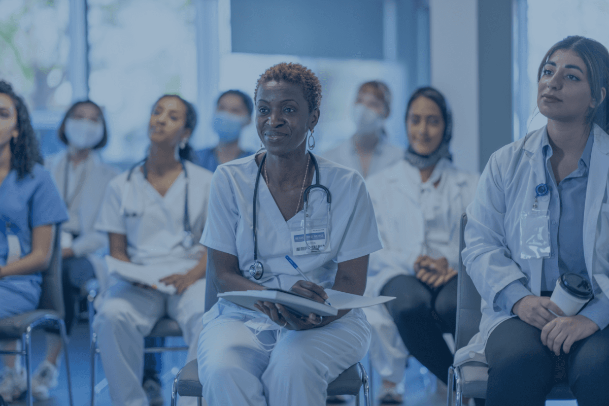 Nurses and doctors in a meeting room